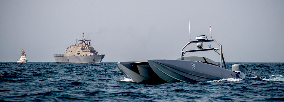 Devil Ray T-38 unmanned surface vessel, the Freedom-variant littoral combat ship USS Sioux City (LCS 11), and the U.S. Coast Guard cutter USCGC Baranof (WPB 1318) sail in the Arabian Gulf.